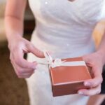 Bride opening her wedding gift